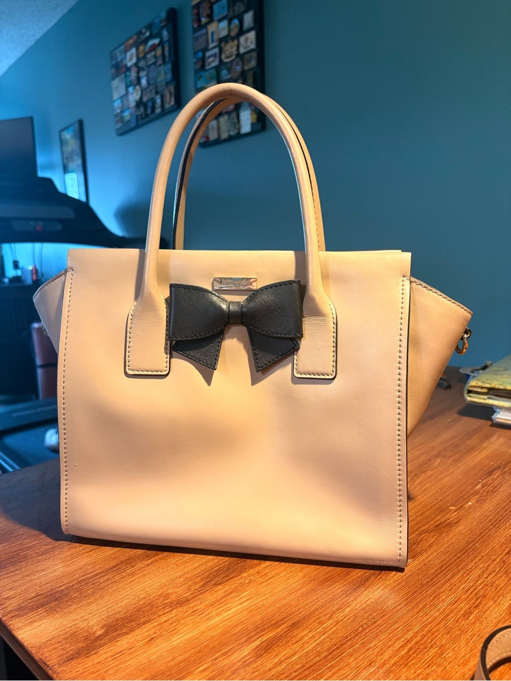 kate spade Cream Crossbody Tote with Black Bow Accent